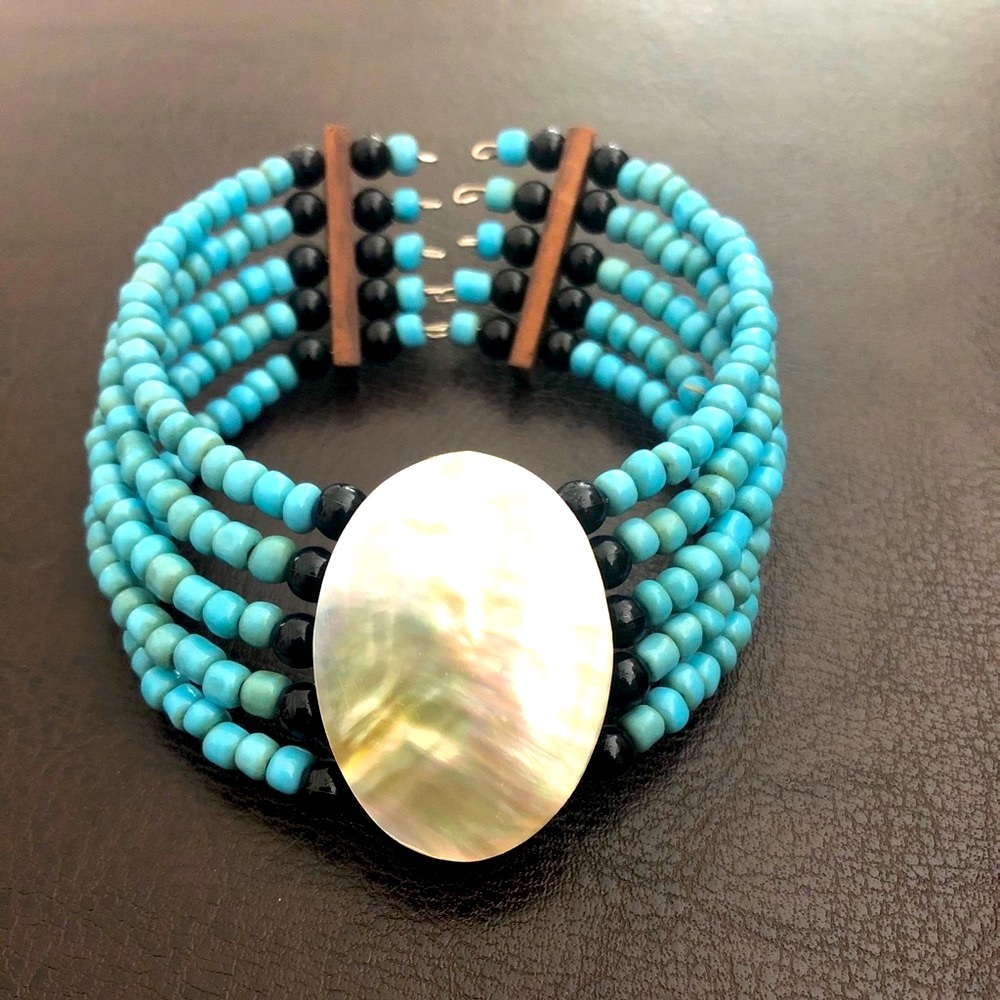 NWOT -Bracelet with motherof Pearl face